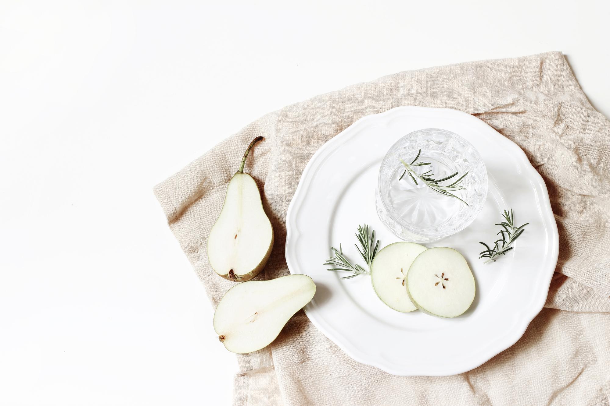 Overhead of simple plated dish on linen
